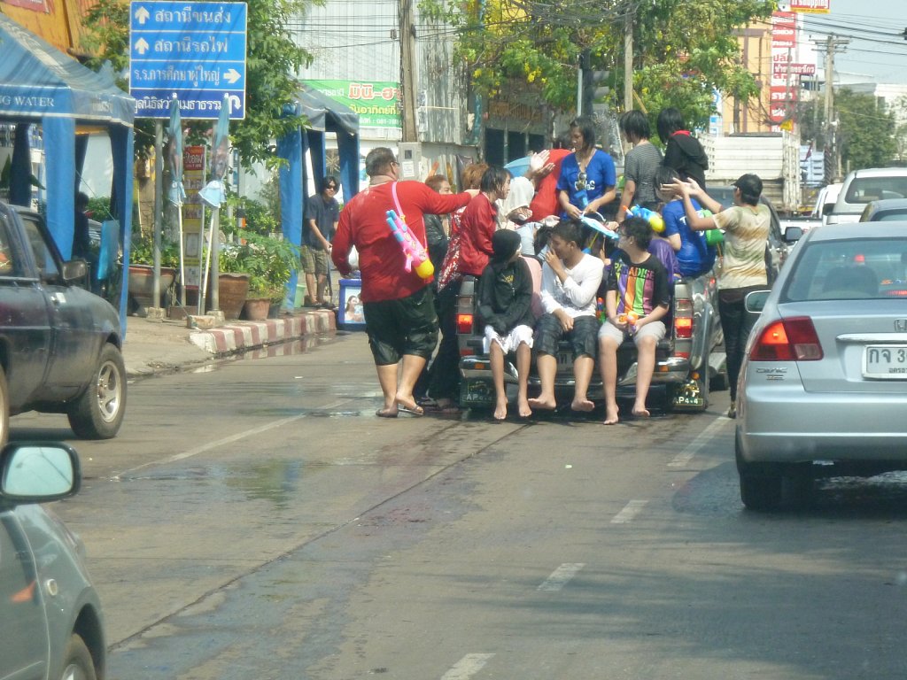 Heavy loaded trucks during Songkran