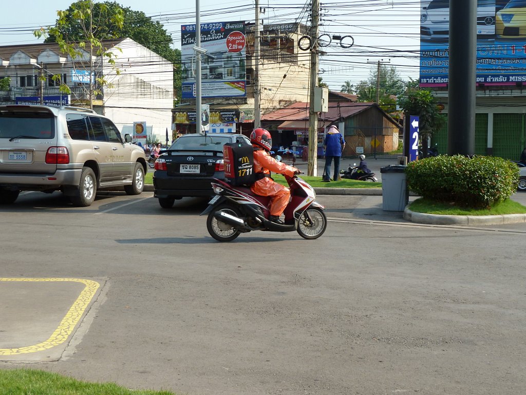 Songkran-prepared McDonald's delivery service driver