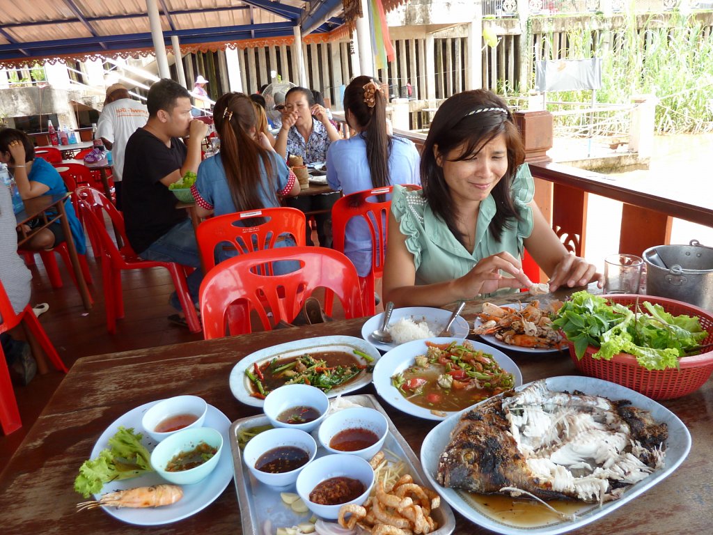 Extensive lunch in a restaurant at Mekong river