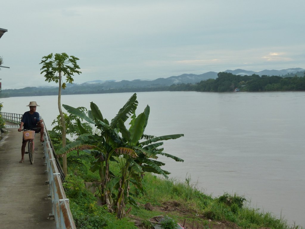 Old man on the Mekong riverbank