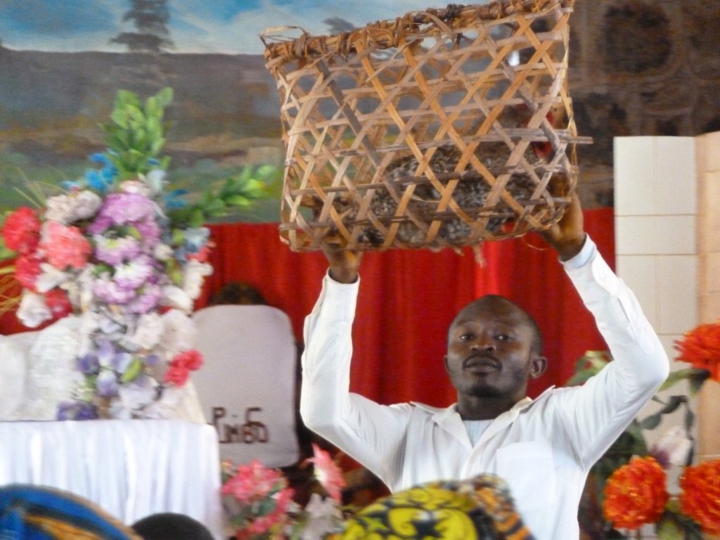 Cock auction at service