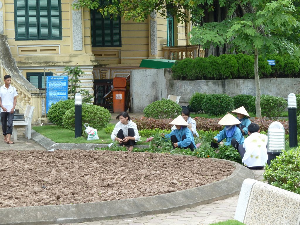Gardeners at the site of the archbishop of Hanoi