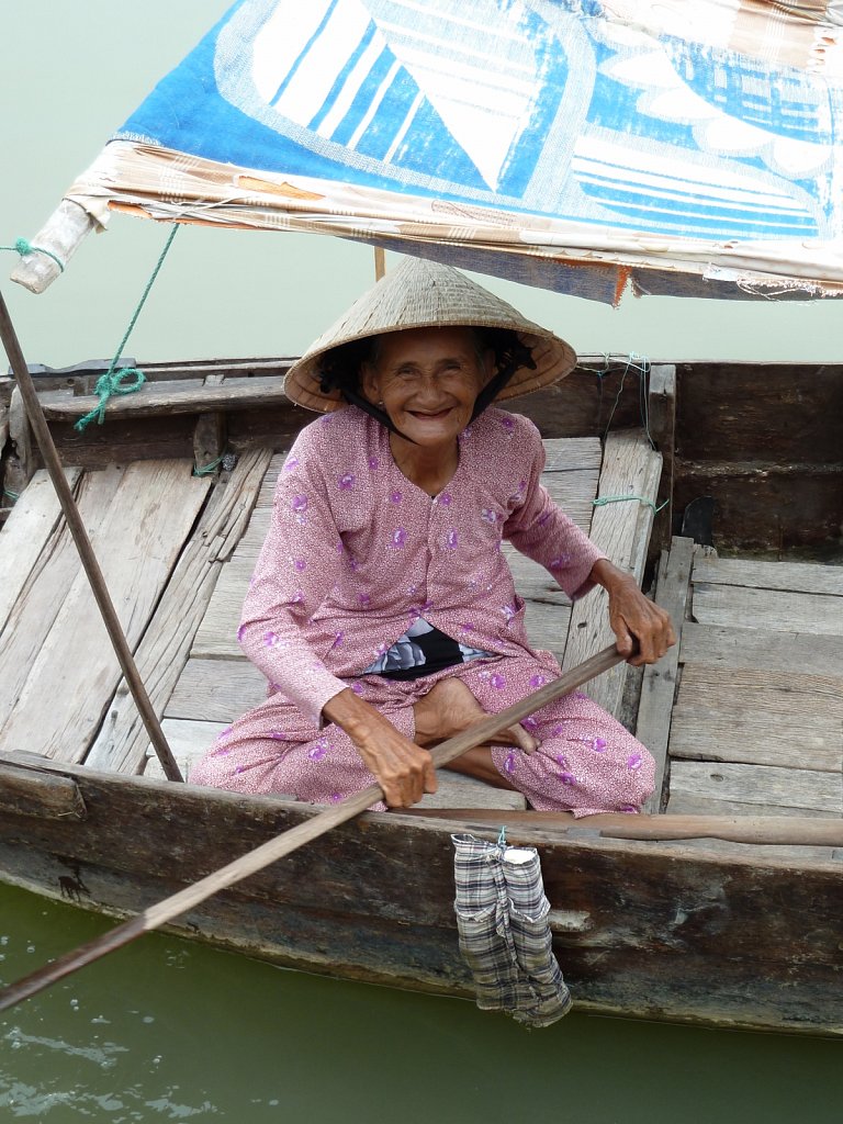 Old woman on her boat