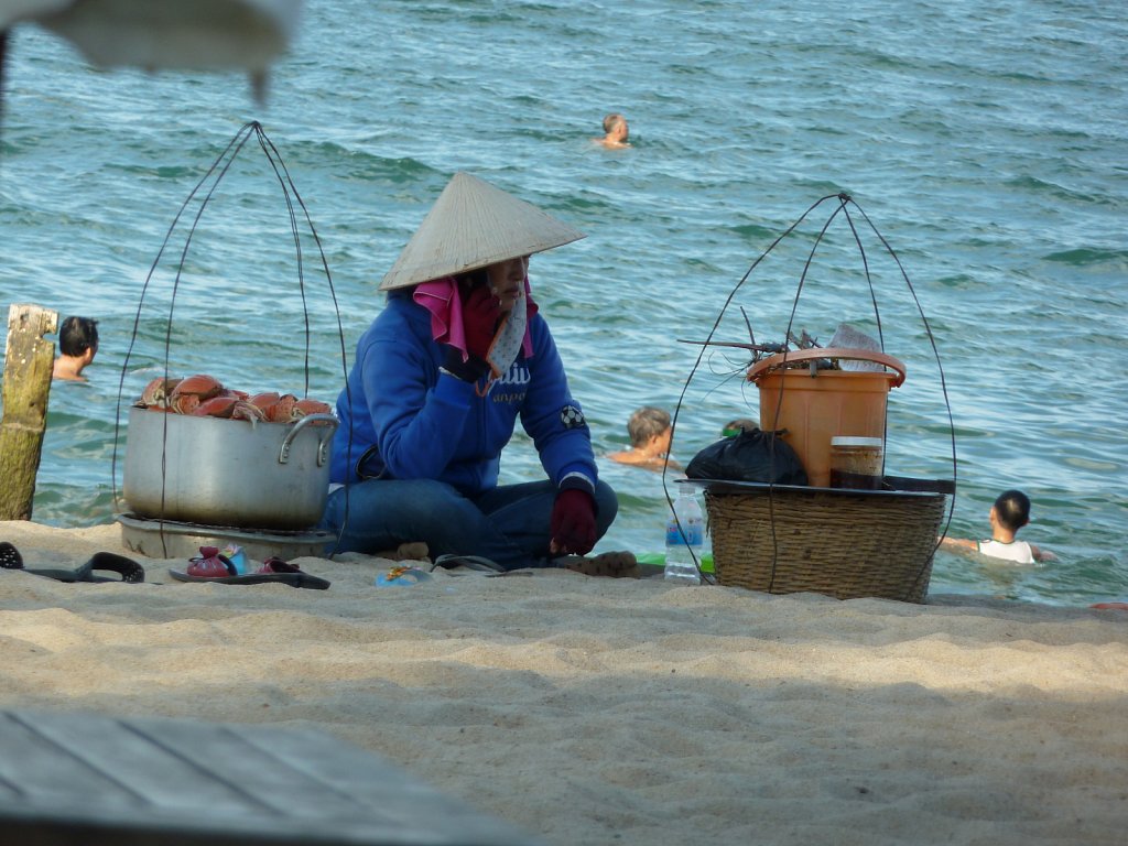 Saleswoman with seafood on the Nha Trang beach