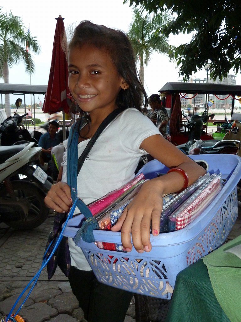 Young girl selling gifts