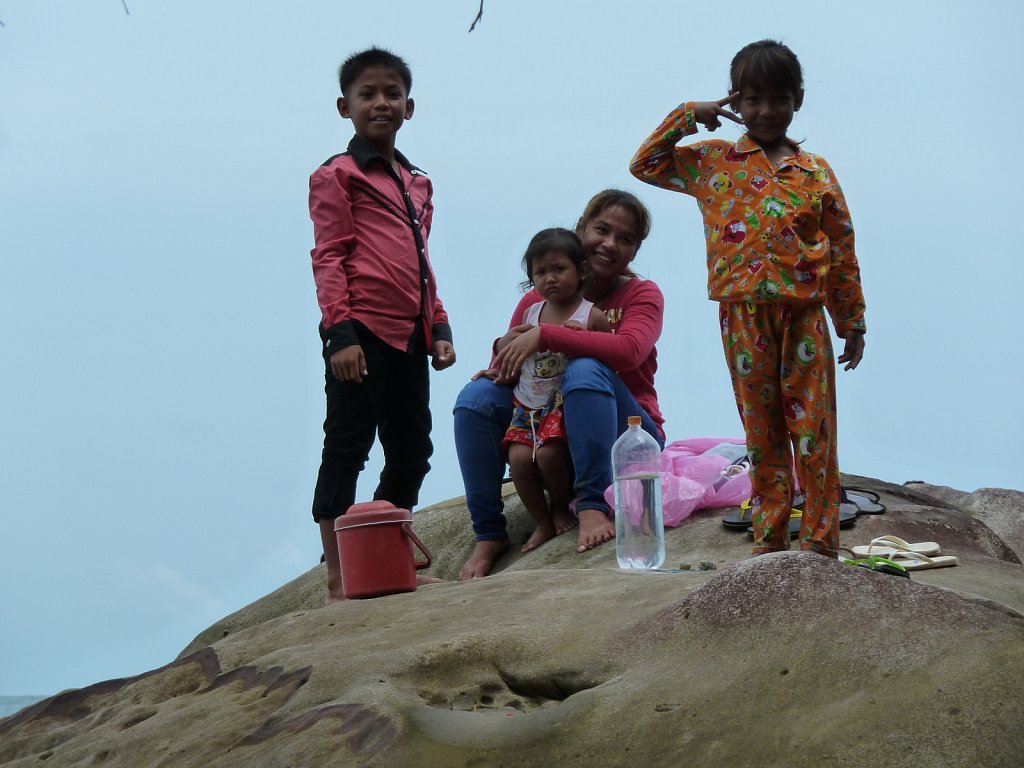 Cambodian woman with her kids at Serendipity Beach in Sihanoukville