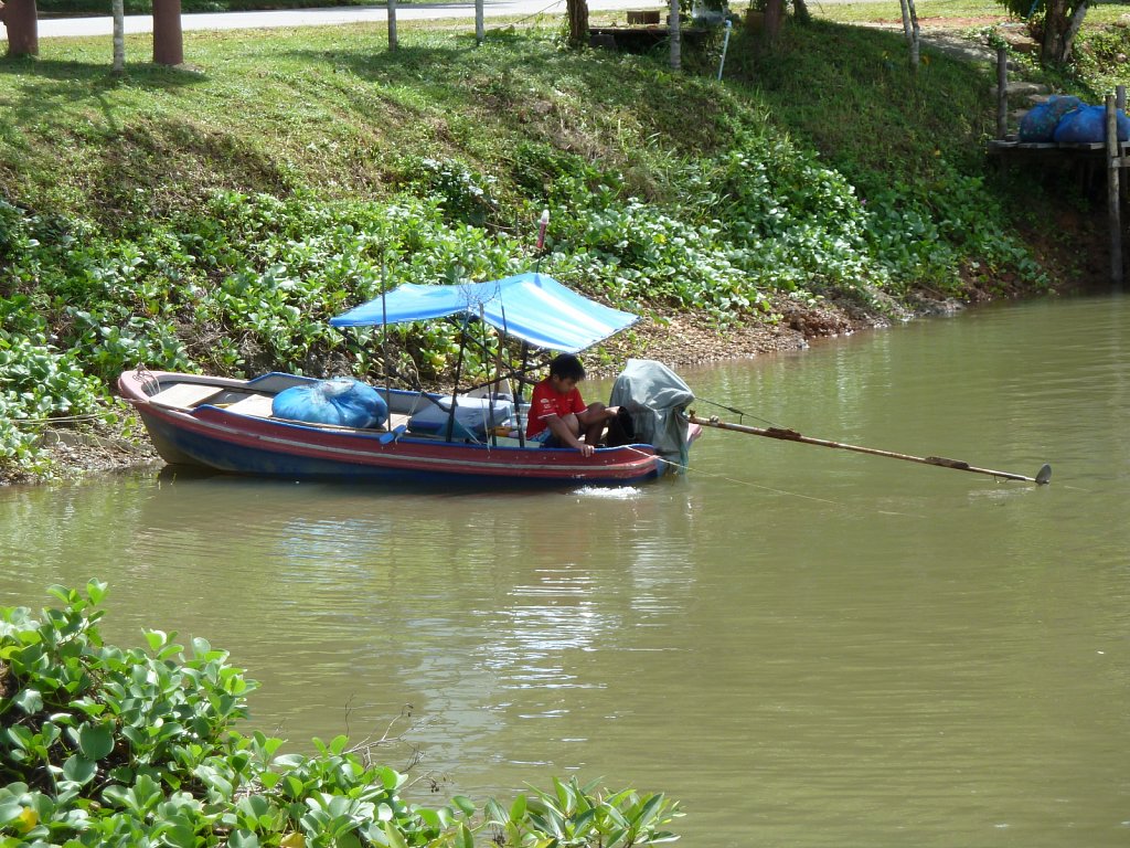 Boy on his boat in the East of Ko Chang