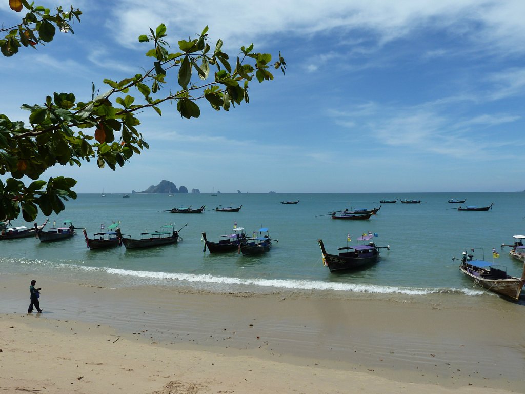 Long tail boats on the beach in Aonang