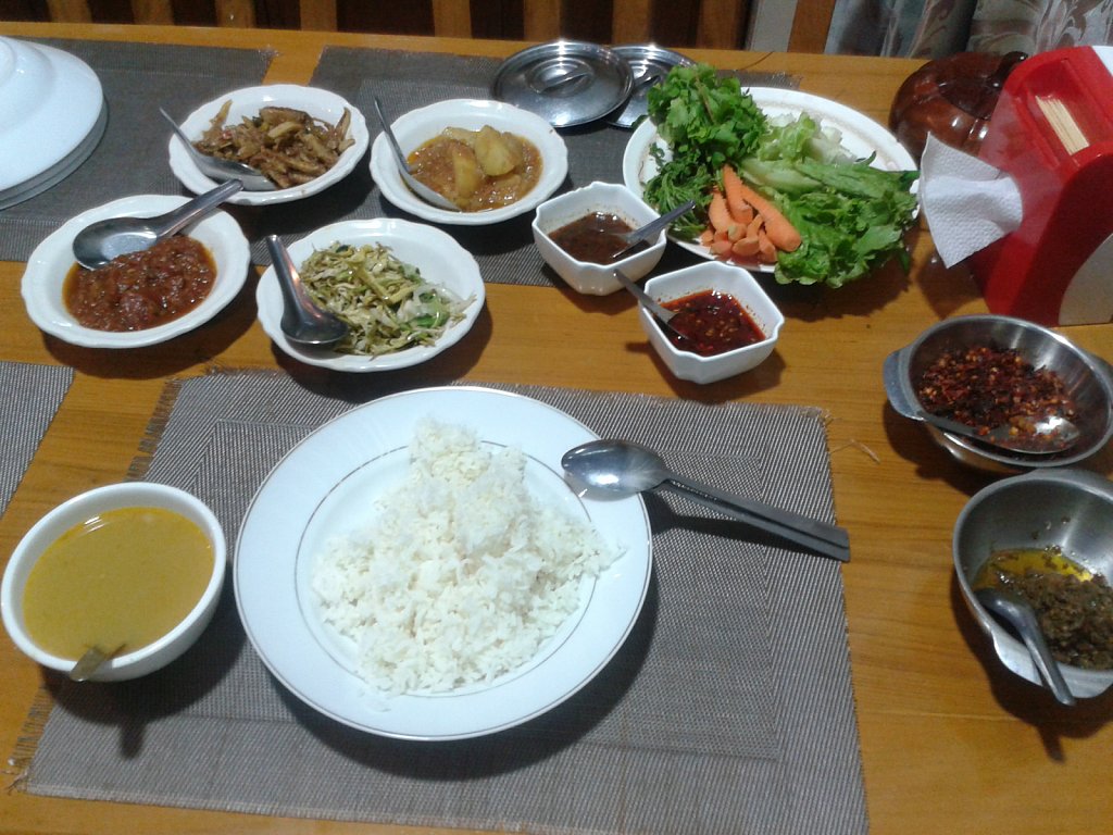 Side dishes of a traditional Burmese meal before ordering the ma