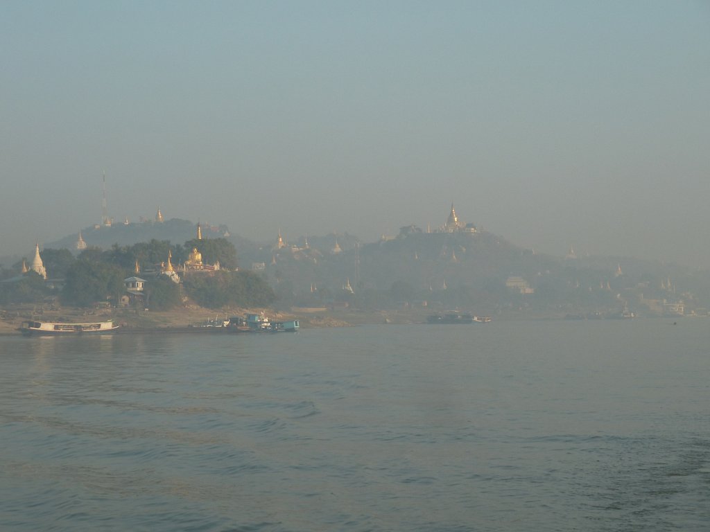 Golden stupas sparkling through the morning mist
