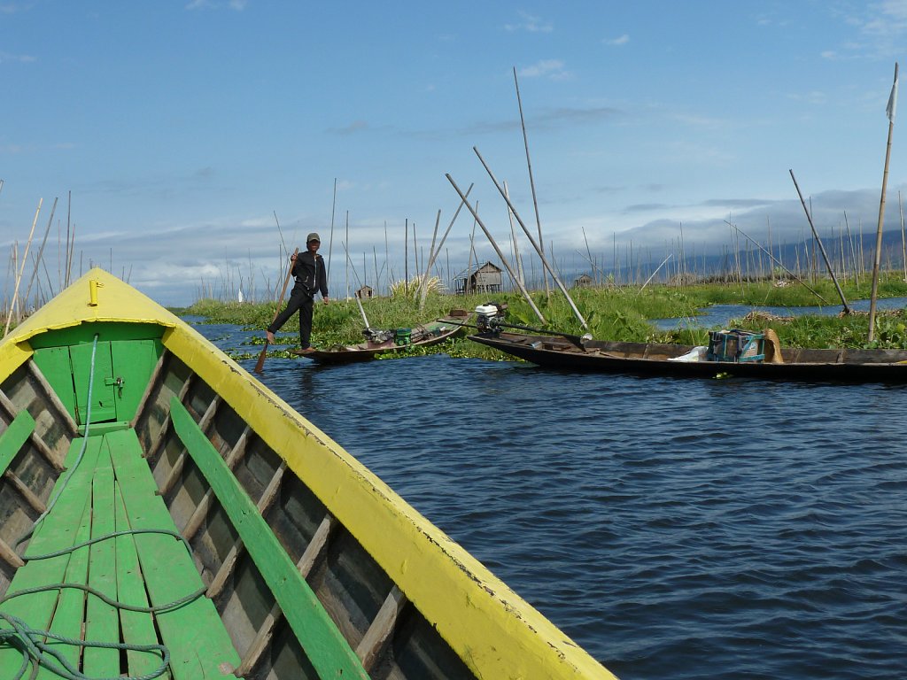 Farmer on his floating garden