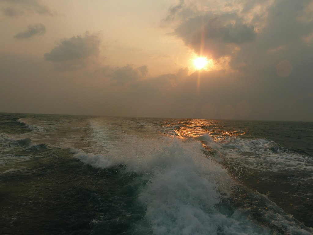 Sunset at the ferry to Ko Samui